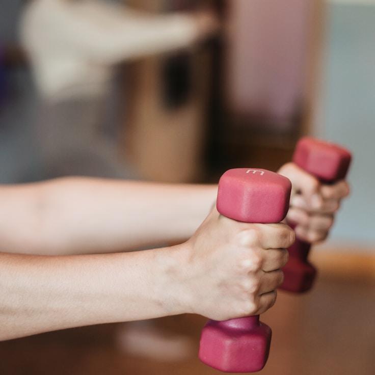 Group fitness class in a modern studio environment