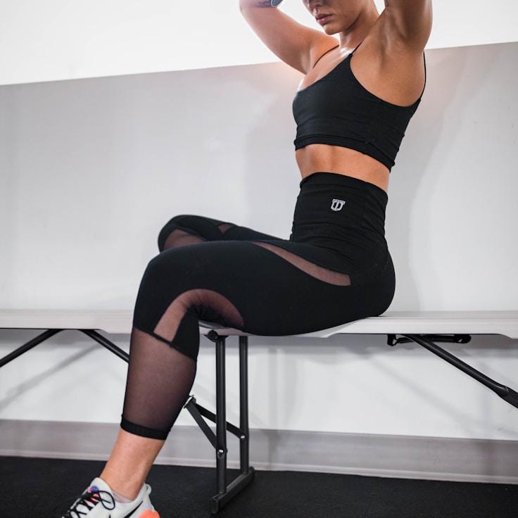 Well-equipped gym interior featuring strength training gear